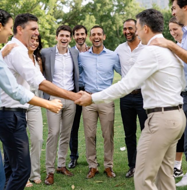 corporate team participating in an outdoor team-building activity